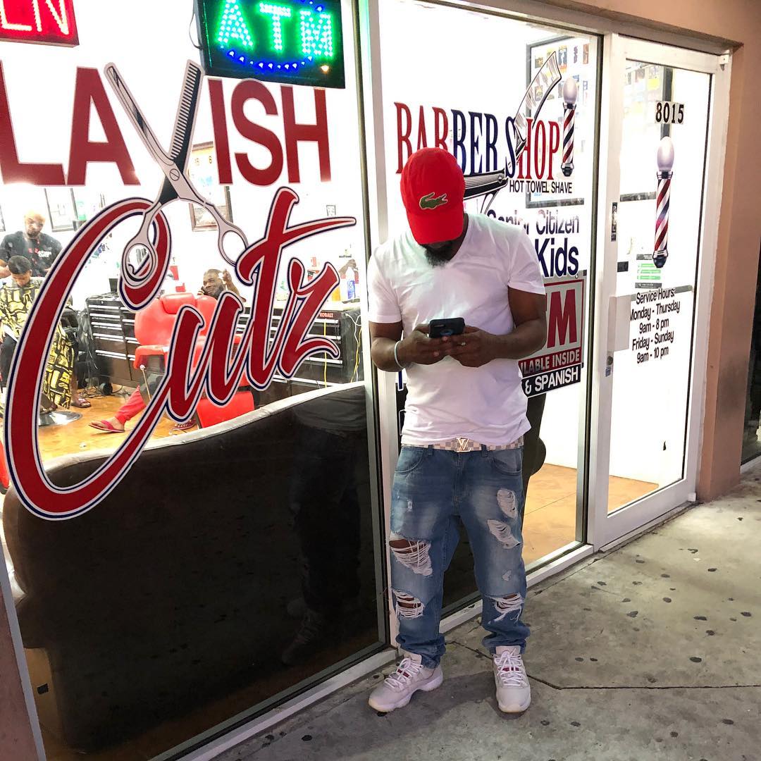 Lavish Cutz storefront at night, Coral Springs, FL
